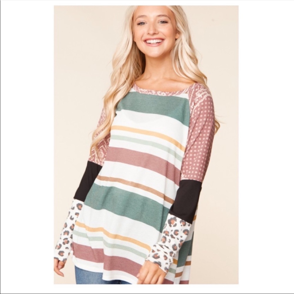 Super soft knit top with animal print and mixed media sleeves